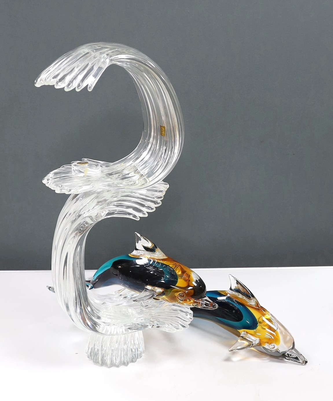 A large Murano Sommerso glass double Dolphin sculpture by Oscar Zanetti, engraved signature and paper label, minor faults to one dolphin, 61cm high